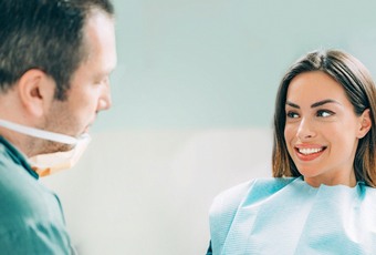 patient talking to dentist