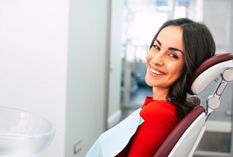 Closeup of woman smiling in dentist's treatment chair