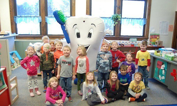 Pearl E. White and classroom of young kids