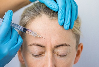 A woman getting a Dysport injection