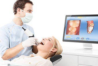 Dentist using CEREC smile design software