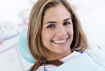 Smiling woman in dental chair