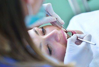 Relaxed patient receiving dental care