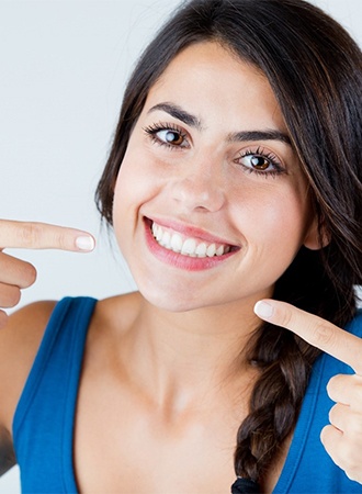 woman with straight teeth from Invisalign in Ripon