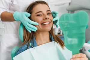 a patient receiving veneers from her dentist