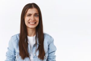 young woman looking concerned 