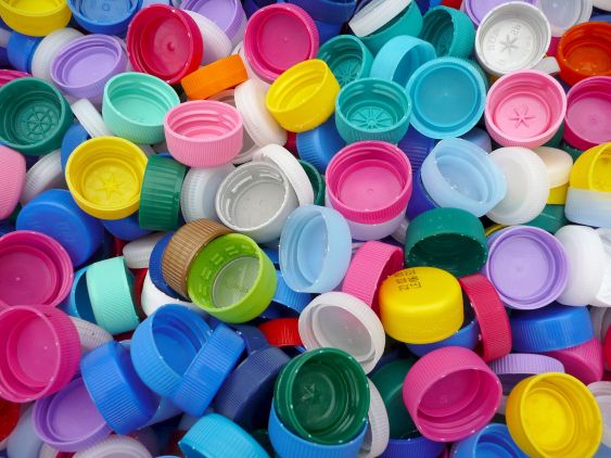 A colorful variety of plastic bottle caps